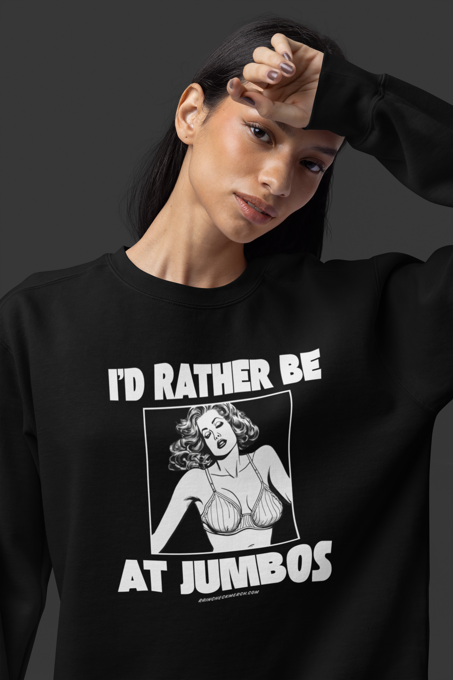 Model wearing black crewneck sweatshirt with text "I’d Rather Be at Jumbo’s" expressing bar vibes and cozy style 🍸💃.